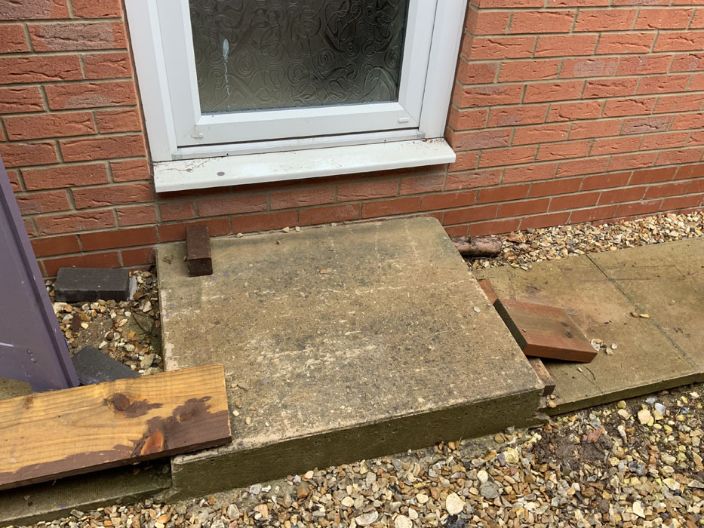 Before image of a flagstone step in DN18